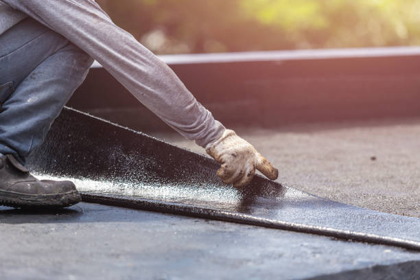 Professional Basement Waterproofing technician working in Orestes, IN